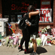 Matti Mejia and Shaina Roberts pause in front of the iconic gay and lesbian bar the Stonewall Inn in New York City on June 13, 2016, to lay flowers and grieve for those killed in Orlando, Fla. An American-born man who had recently pledged allegiance to the Islamic State group killed 49 people early June 12, 2016, at a gay nightclub in Orlando. The massacre is the deadliest mass shooting in U.S. history.
Spencer Platt/Getty Images